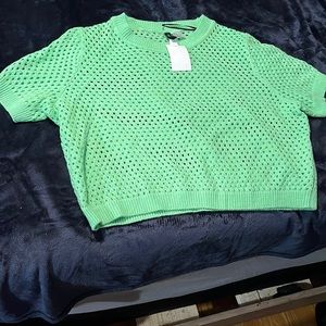 Lime green knit crop top.